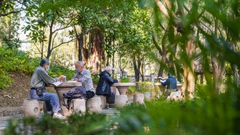 Traditional granite tables and stools are placed in tree shaded areas to welcome the visitors to take a seat and enjoy the quiet ambience of the Park.
